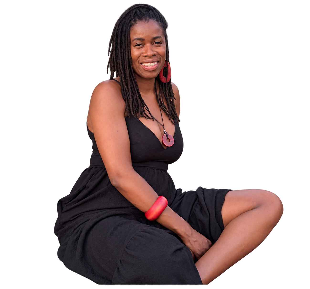 Tye Johnson smiling, seated in a black dress